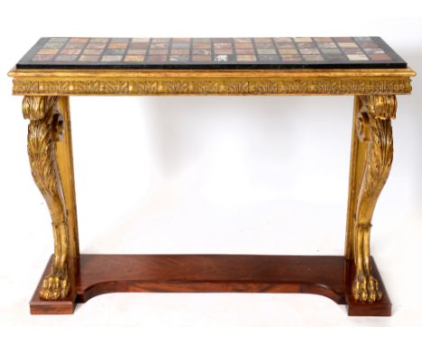 An 18th century style console table, the specimen marble inlaid top above a frieze of carved acanthus leaves, and on a pair o