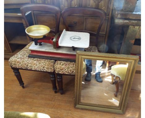 A set of scales, with brass weights, a mirror, an oak glazed display cabinet and a pair of chairs