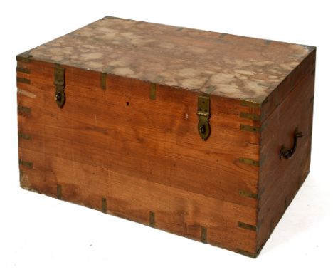 A 19th century teak trunk, bound in brass, 95 cm wide