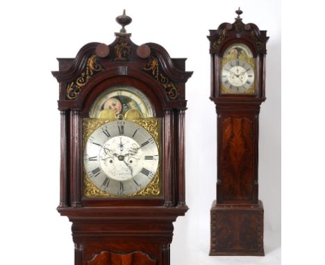 A longcase clock, the 33 cm arched square brass dial, with Roman numerals and calendar to the silvered chapter ring, the silv