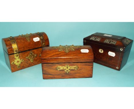 An inlaid rosewood tea caddy, 20.5 cm wide, a walnut dome top tea caddy and a similar stationary box (lacks interior) (3)