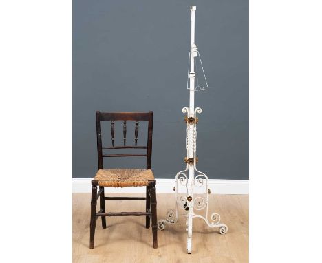 An ebonised spindle back occasional chair with a rush seat, 40cm wide x 34cm deep x 103cm high together with an adjustable wh