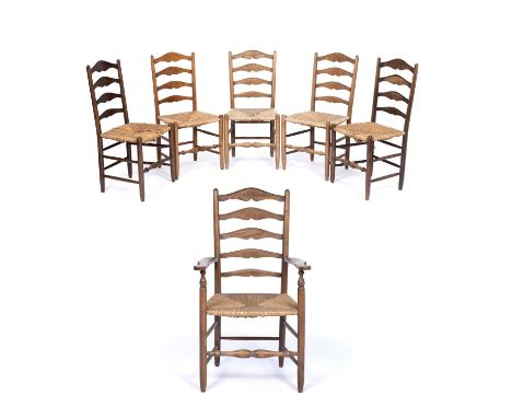 Gordon Russell (1892-1980) a set of six Cotswold school dining chairs in oak, with ladder back and rush seat, 207cm high x 57