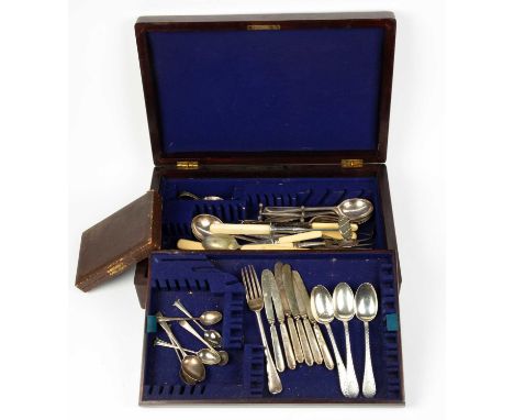 A collection of cutlery predominantly silver plate, three silver dessert spoons, a silver fork, six silver teaspoons, approxi