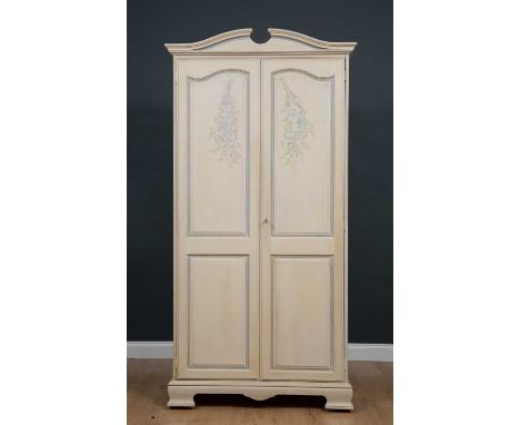 A modern painted pine two door wardrobe with panelled doors and ogee bracket feet, 99cm wide x 59cm deep x 200cm highConditio