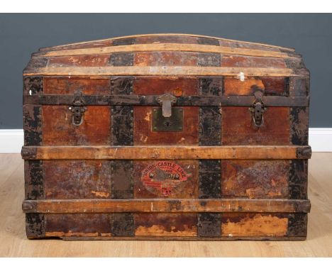 An early 20th century dome topped leather and bentwood trunk 92cm wide x 53cm deep x 61cm highCondition report: Leather handl