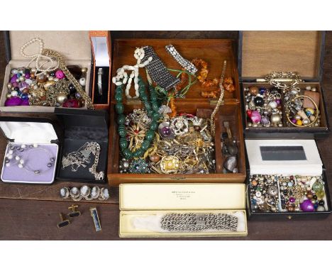 A collection of costume jewellery to include a silver bangle and an amber necklaceCondition report: At present, there is no c