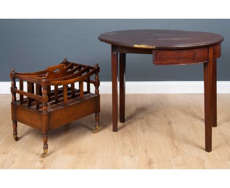 A George III mahogany demi-lune fold over tea table with fluted square tapering legs, 89cm wide x 35cm deep x 73.5cm high tog