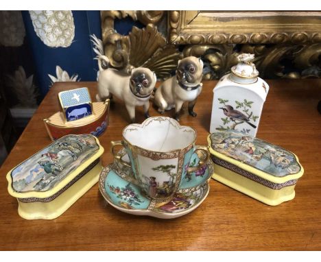 A continental porcelain tea canister decorated with butterflies and birds, with an associated cover, 13cm high together with 
