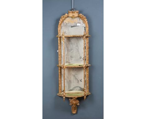 A Victorian gilt hanging three tier wall shelf with mirrored back, applied with gesso ornament, 41cm wide x 120cm highConditi