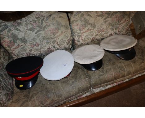 Four various Army and Navy caps 