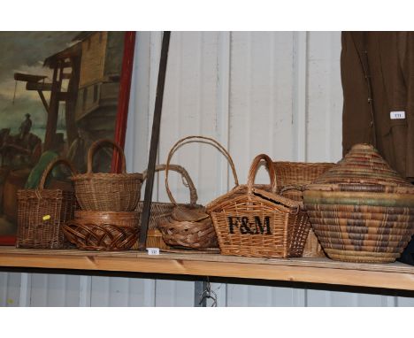 A collection of various basket ware including a Fortnum & Mason hamper 