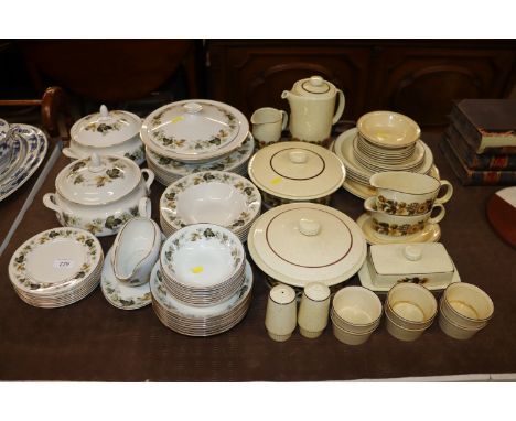 A quantity of Royal Doulton "Larchmont" pattern dinnerware; together with a quantity of Poole dinnerware and tea ware 