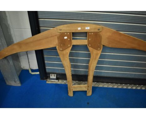 A vintage jumper display stand, possibly Hebridean or other Scottish isles wool interest, height approx 86cm, extended width 