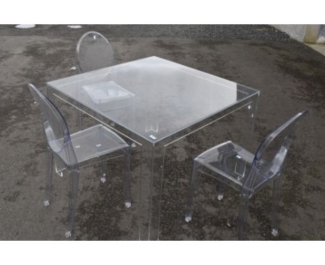 A vintage clear perspex 'Ghost' style dining table and three chairs, in the manner of La Marie by Starck for Kartell