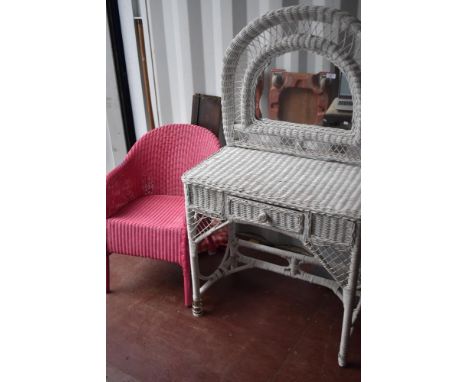 A vintage wicker dressing table and Lloyd Loom tub chair