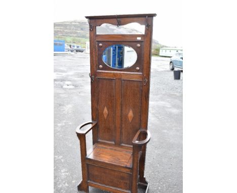 A late 19th or early 20th Century oak hall stand in the Jacobean revival style with Art Nouveau handles, height approx. 188 w
