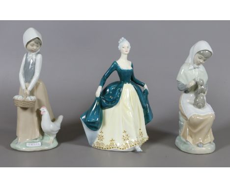 Two Nao figures depicting a girl holding a rabbit and girl holding a basket along with a Royal Doulton figure six Regal lady.