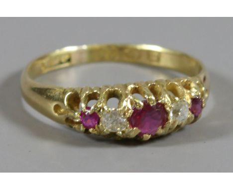 A Victorian 18ct gold ruby and diamond five stone ring. Assayed Birmingham 1896. 2.6 grams, size N.