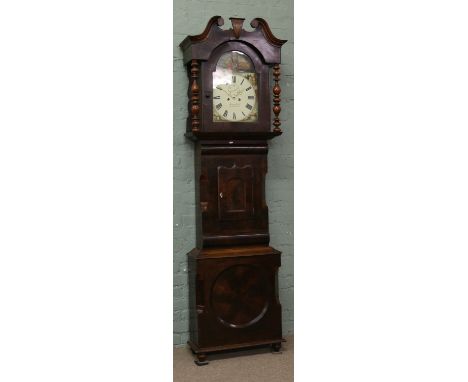 A Victorian mahogany longcase clock by Henry Odel Barnsley the Roman numeral dial with painted arch pediment and subsidiary s