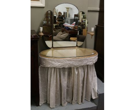 A vintage limed oak triple mirror dressing table, incorporating light sconces.