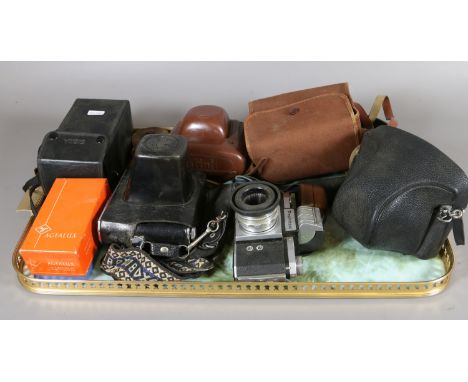 A collection of vintage cased cameras light meters and a signed lense along with a Agfalux pocket flash gun.