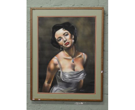 A large framed pastel portrait of Elizabeth Taylor, signed Diesel.