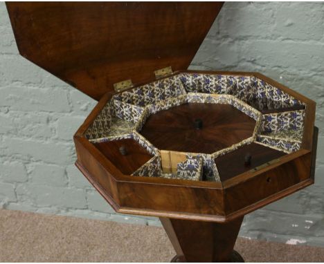 A Victorian inlaid walnut work box on carved tripod base. (Key in office)