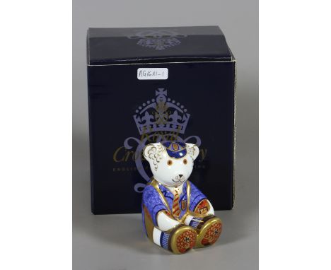 A boxed Royal Crown Derby paperweight, school boy teddy with gold stopper, first quality. Condition Report. To be used as a g