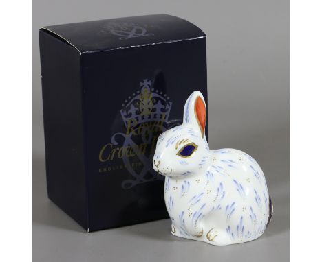 A boxed Royal Crown Derby paperweight, snowny rabbit designed by June Ryanscombe, gold stopper, first quality. Condition Repo