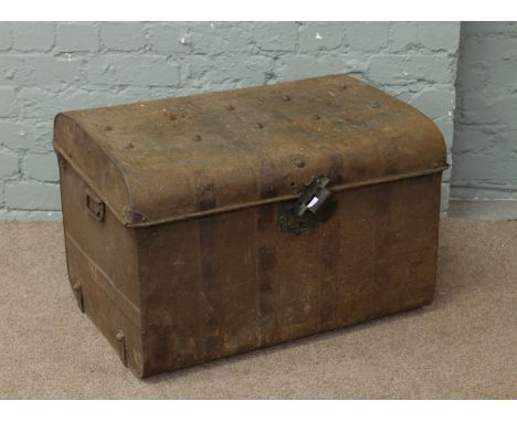 A metal travelling trunk.