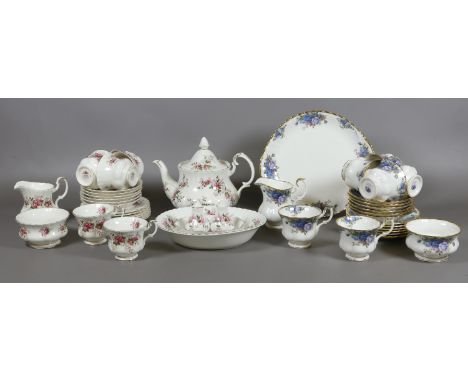A Royal Albert moonlight rose part tea service, approximately twenty two pieces and a Royal Albert lavender rose part tea ser
