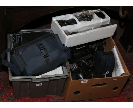 Two boxes of various cameras to include compact digital and film examples.