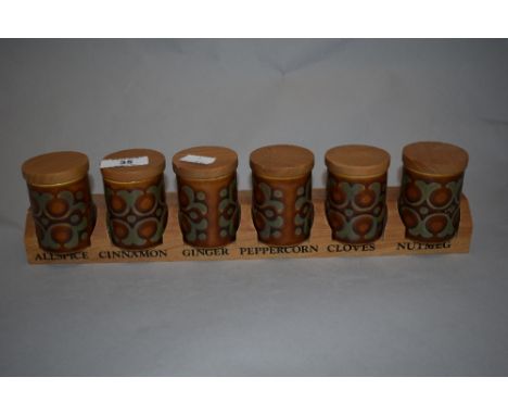 Six Hornsea pottery 'Bronte' spice jars, in possibly associated wooden rack.