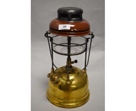 A 1930s/40s brass and enamel Tilley lamp.