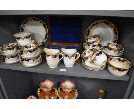 A collection of late 19th/early 20th century 'Empress' china, graded plates, jugs, cups and saucers and sugar basin included,
