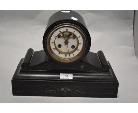 A Victorian black marble mantel clock, having etched scroll detail and green natural stone inset detailing, enamel dial with 