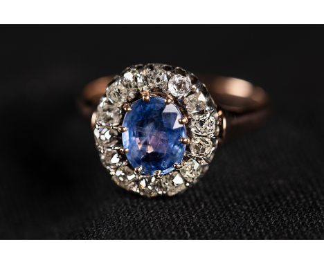 Gold Ring with sapphire of 1,2 carat  and Diamonds of 0,6  of carat