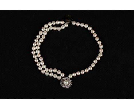 Pearl bracelet with three lines of akoya pearls of 8 mm diameter, white gold 750 clasp with diamonds 2,6 carat.
