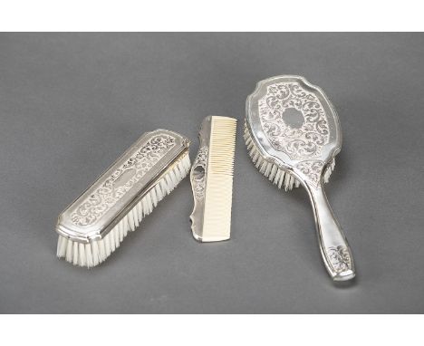 Silver coiffeur set  with two brush and a comb ,  engraved,