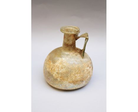 Early glass flask , round shape with handgrip and long neck, green transparent glass , possible ancient earth found, 14x13cm