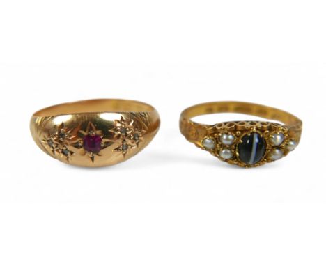 An 18ct gold ruby ring and a 15ct pearl ring, 18ct ring size N, 2.0g, 15ct ring size N, 1.6g.(2)