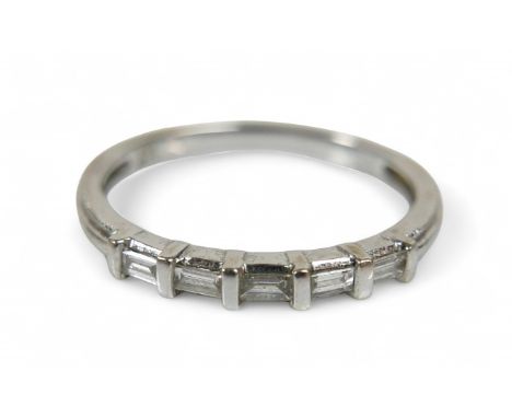 A 9ct white gold ring, set with five small baguette cut diamonds, size N, 1.7g, with box.
