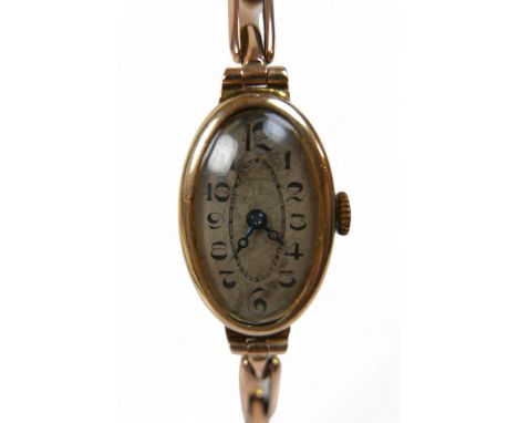A 9ct yellow gold lady's bracelet wristwatch, manual wind, sprung strap, 14mm case, 11.7g gross, running.