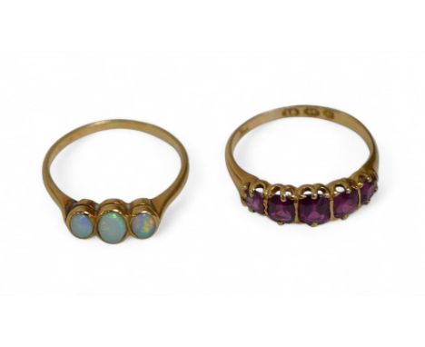 Two 18ct gold dress rings, comprising a five stone amethyst ring, largest central stone, 3 by 4mm, size Q, 3.3g, together wit