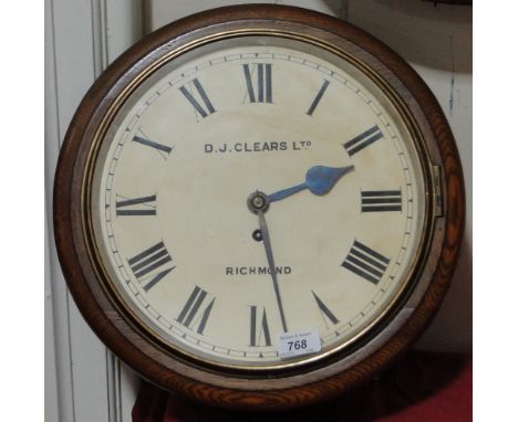 An oak cased dial wall clock,
with single fusee movement, marked D J Clears Ltd., Richmond, complete with key and pendulum, w