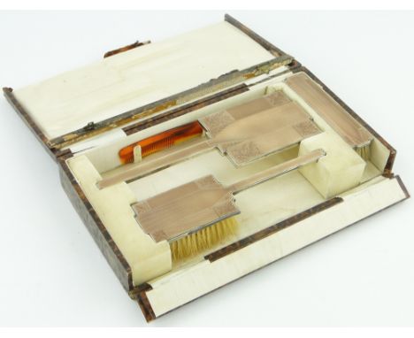 A silver and peach enamel Art Deco dressing table set,
by Hukin & Heath, Birmingham 1934.