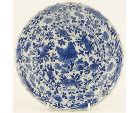 A 19th century Chinese blue and white porcelain dish,
with painted floral designs, 8.25" across.