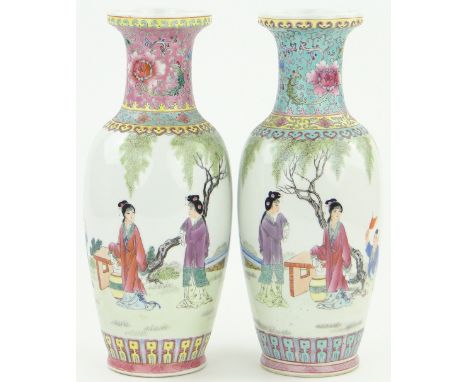 Pair of Chinese Republic porcelain vases,
decorated with scenes of figures in gardens, height 12"