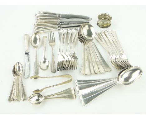 A quantity of silver flatware,
including sets of 6 dessert spoons, soup spoons and table forks, Sheffield 1943, and other var